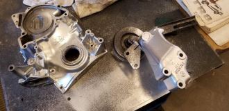 fresh paint of timing cover and ac pulley bracket
